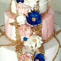 Floral wedding cake in blue and pink