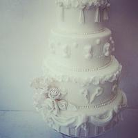 vintage 5 tier white cameo wedding cake.