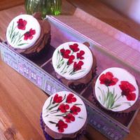 Hand painted poppy cupcakes
