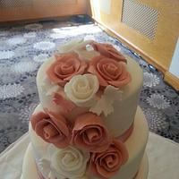 Cascading rose wedding cake