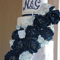 6 tier Navy blue, white and silver wedding cake