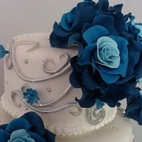 Blue roses and silver twirls