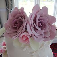 Lilac, pink and lace wedding cake