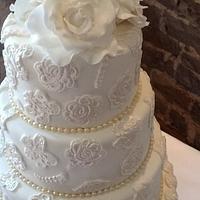 For tier Lace wedding cake with dog decoration