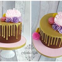 Gold drip cake with wafer paper flowers