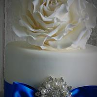 Ruffle and rose wedding cake