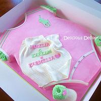 Pink and Green Polo Onesie cake
