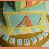 Baby ABC Blocks Cake with a Little Boy Topper ~