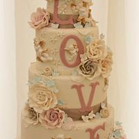 Neutral toned LOVE cake