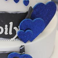 Royal blue, black and white " and they lived happily ever after" wedding cake