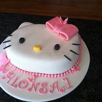 Hello Kitty Birthday Cake with matching cupcakes