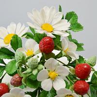 strawberries and mini daisy cake