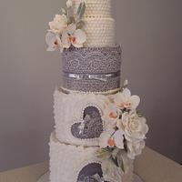 Wedding cake with orchids and roses ...