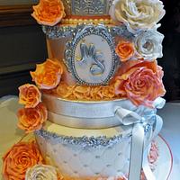 Coral, white and silver Birdcage wedding cake