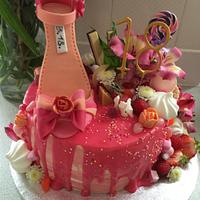 Pink shoe drip cake
