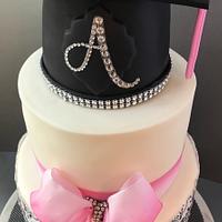 Pink and black graduation cake