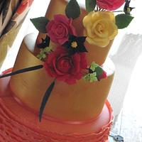 Gold and Coral wedding cake