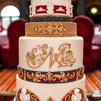 Ornate wedding cake with faux stand
