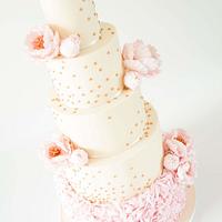 Rose gold sequins and peonies wedding cake