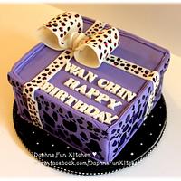 Purple leopard gift box cake