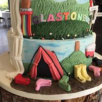 Glastonbury themed reveal wedding cake