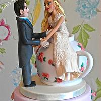 vintage wedding cake with an Alice in wonderland theme :)