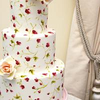 Tiered painted roses cake