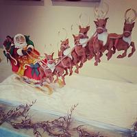 Santa with his flying reindeers