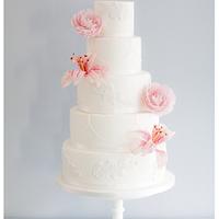 Romantic lilies and peonies wedding cake
