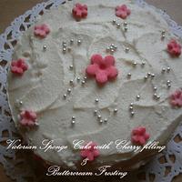 Victorian Sponge Cake with cherry filling and butter cream frosting