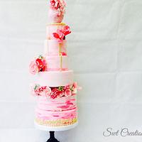 Hand painted pink ombré wedding cake 
