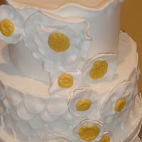A WHITE AND MUSTARD WEDDING CAKE