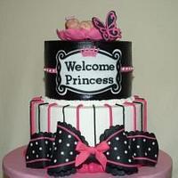 Hot pink and black baby shower cake