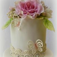 Pink and ivory wedding cake