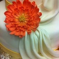 Draped cake with Gerber Daisies