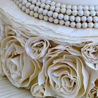 Roses, pearls and ruffles wedding cake