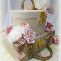 Suitcase and hat box wedding cake