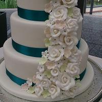 Cascading flower wedding cake 