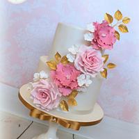 Pretty pink and gold floral cake