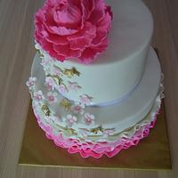 Pink ruffle wedding cake