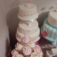 Classic three tier heart and flowers wedding cake