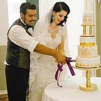 White and gold vintage Disney inspired wedding cake