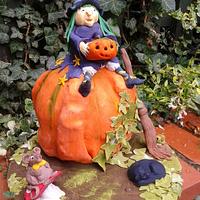 Halloween Witch on pumpkin 