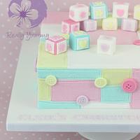 Christening cake, with patchwork and baby blocks