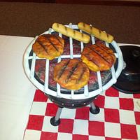 tailgaiting cake with grill and cooler