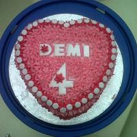 Pink heart birthday cake