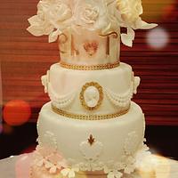 White and gold wedding  cake