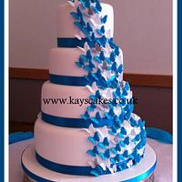 Deep Turquoise & White Butterfly Cascade Wedding Cake