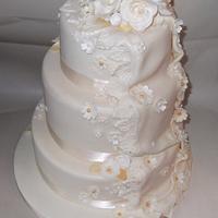 Cream and gold wedding cake