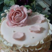 Ombre ruffle wedding cake with sugar paste peonies and roses